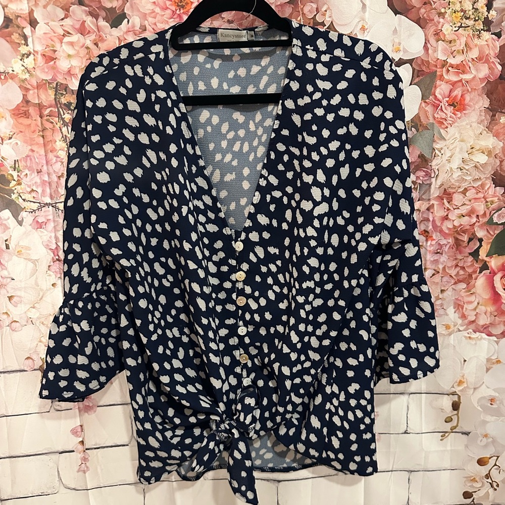 V Neck dotted buttoned shirt with front tie. Size medium, bought from Amazon